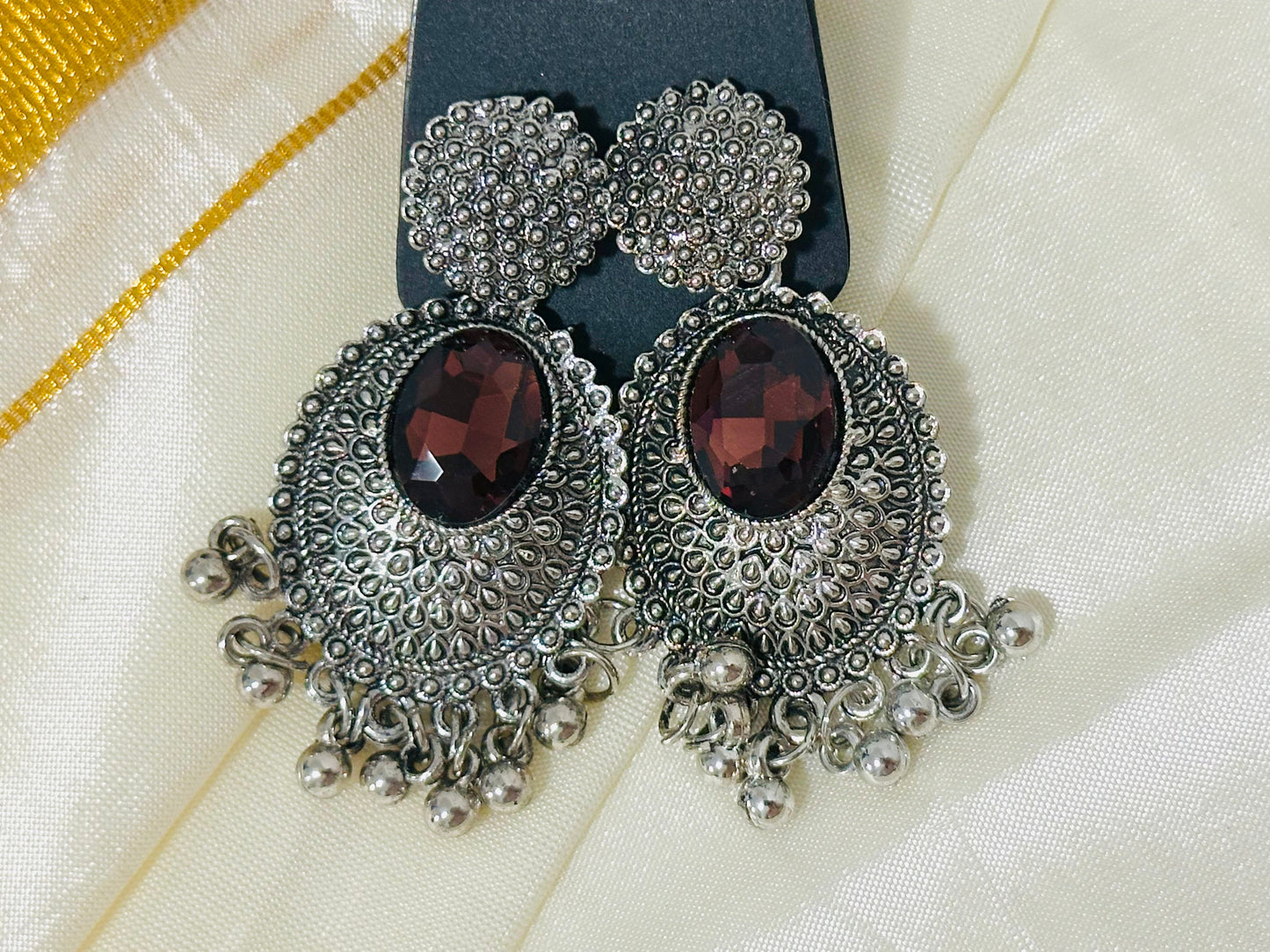 Regal Oxidized Silver Drop Earrings with color Stone