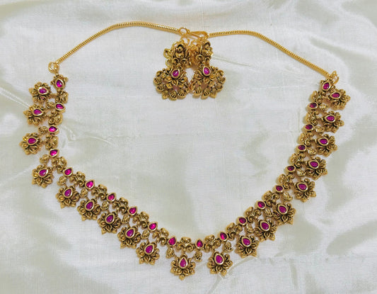 Gold-Toned Floral Necklace and Earring Set with Ruby Accents