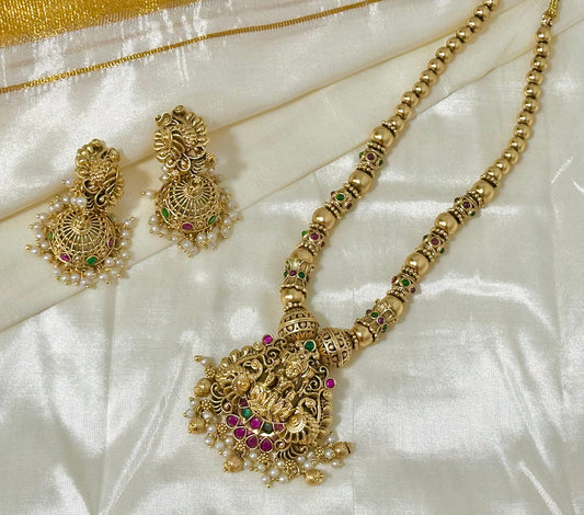 Traditional Indian Gold Pendant Necklace and Jhumka Earring Set with Lakshmi Motif