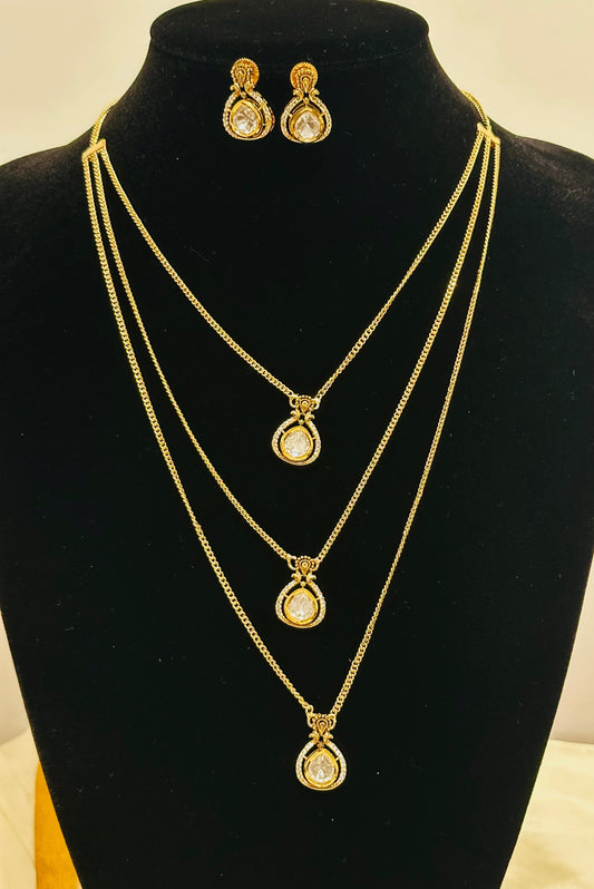 Exquisite Gold-Toned Multi-Layered Necklace & Earring Set with Sparkling Teardrop Pendants