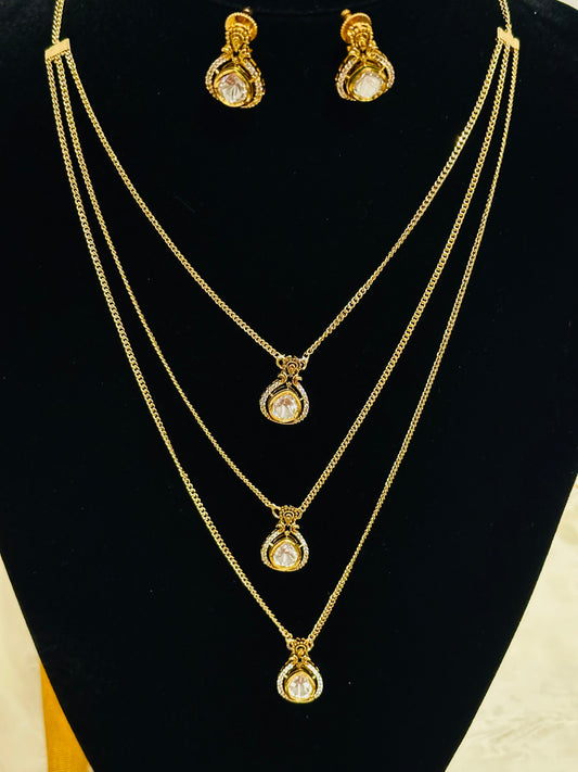 Exquisite Gold-Toned Multi-Layered Necklace & Earring Set with Sparkling Teardrop Pendants
