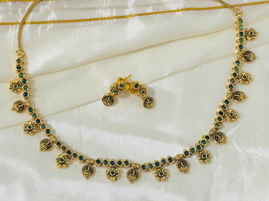 Gold-Toned necklace and Earrings with Green Accents