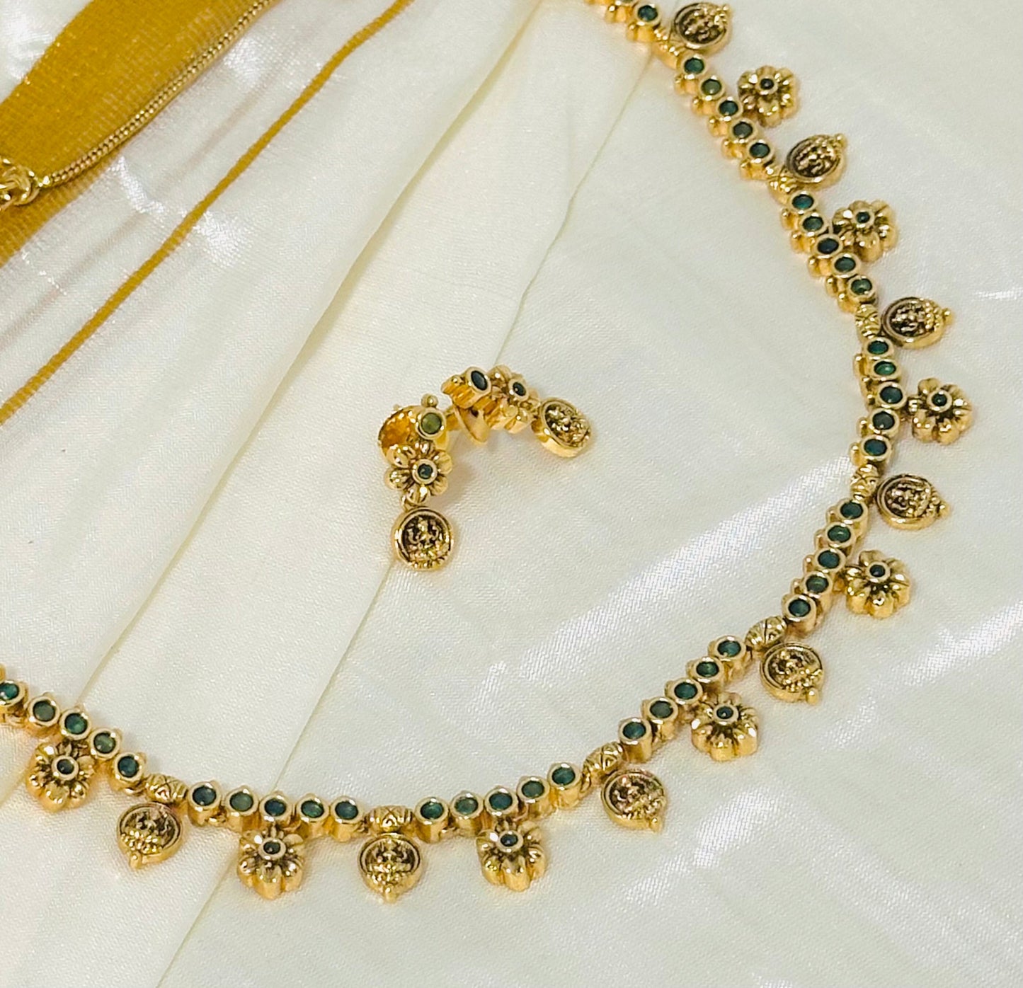 Gold-Toned necklace and Earrings with Green Accents