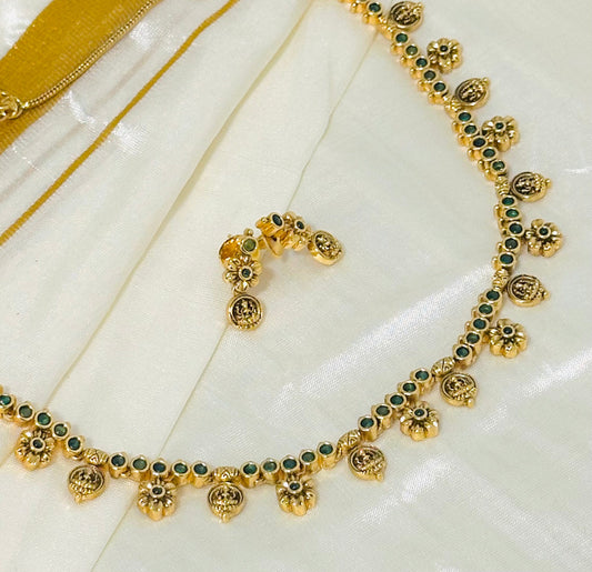 Gold-Toned necklace and Earrings with Green Accents