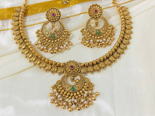 Exquisite Antique Gold-Toned Choker Necklace and Jhumka Earring Set with Floral and Crescent Motifs