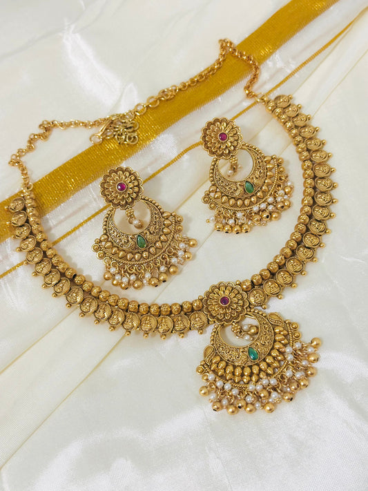 Exquisite Antique Gold-Toned Choker Necklace and Jhumka Earring Set with Floral and Crescent Motifs