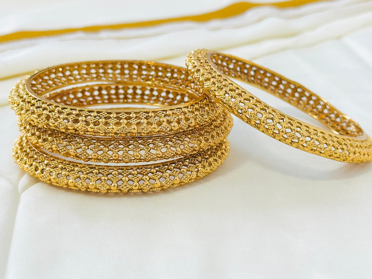 Intricate Gold-Toned Filigree Pattern Bangles (Set of 4)