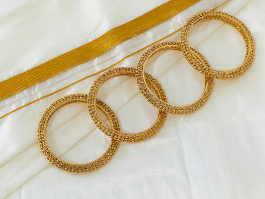 Intricate Gold-Toned Filigree Pattern Bangles (Set of 4)
