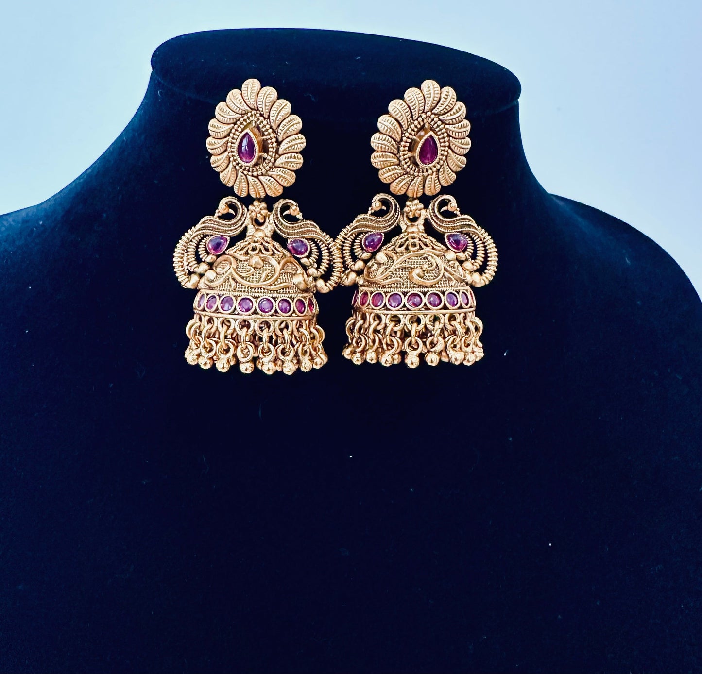 Exquisite Gold-Toned Peacock Jhumka Earrings with Ruby Accents