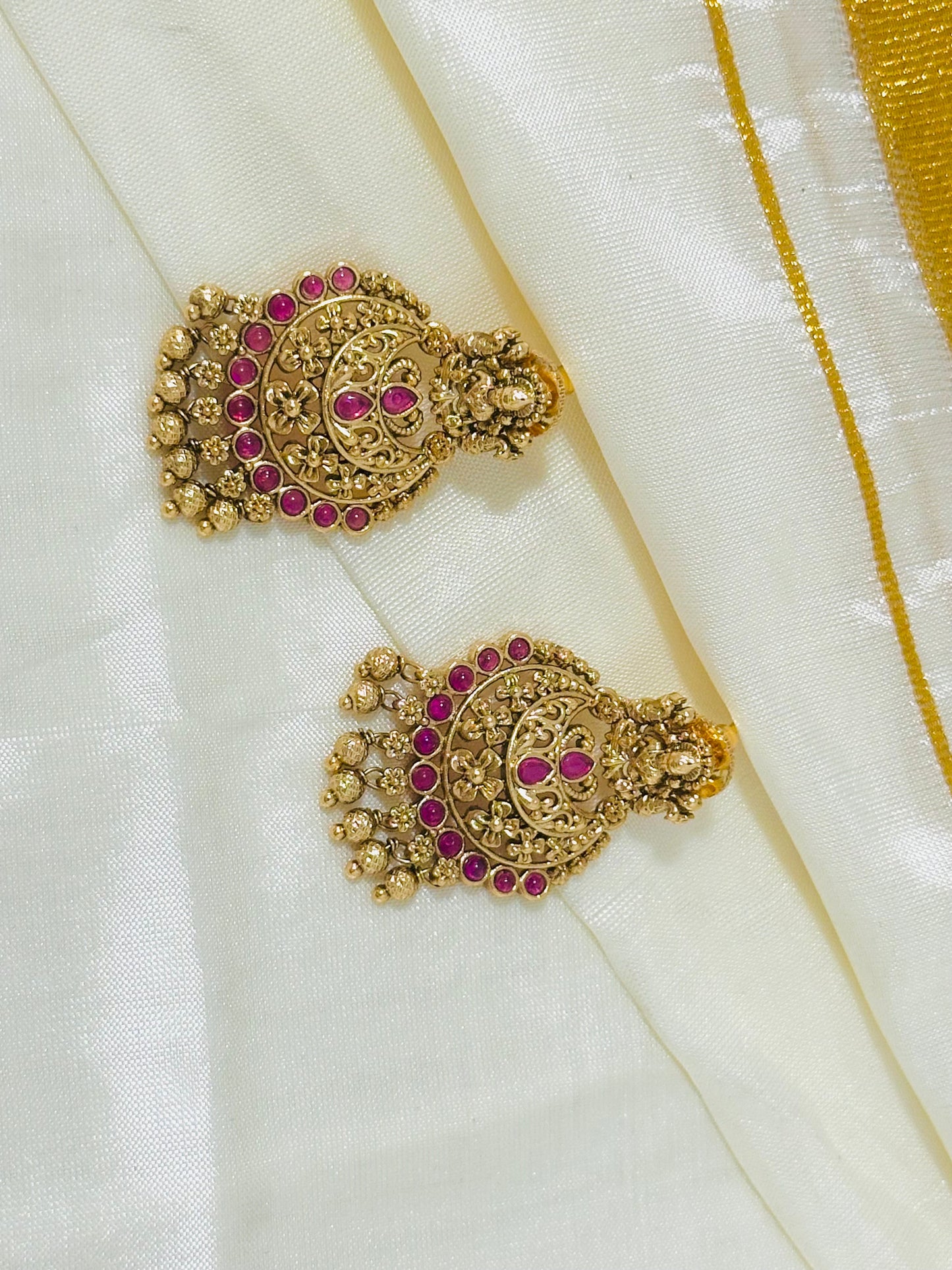 Magnificent Traditional Gold-Toned Lakshmi Temple Chandbali Earrings with Ruby Accents