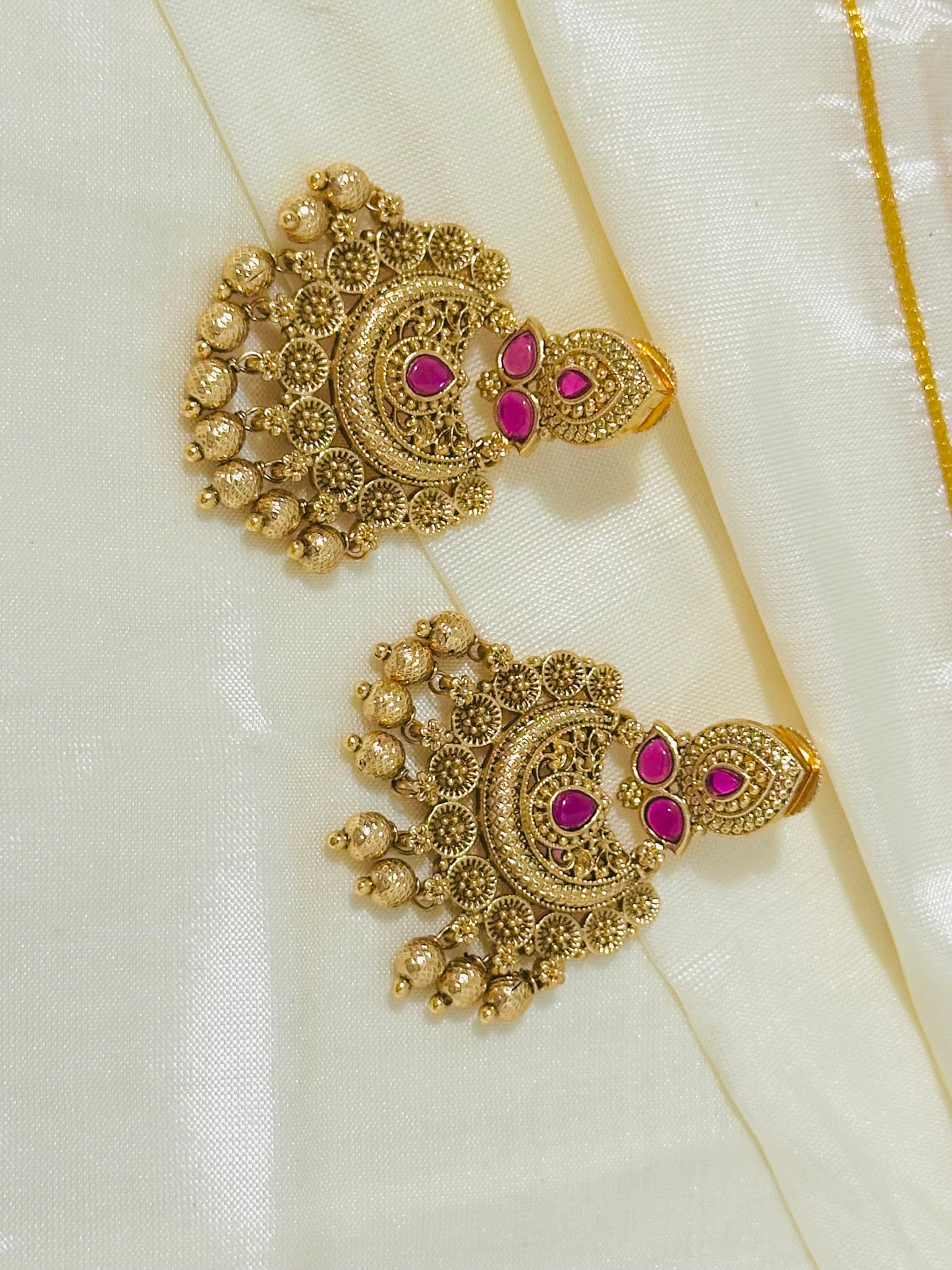 Ornate Gold-Toned Traditional Chandbali Earrings with Ruby Accents