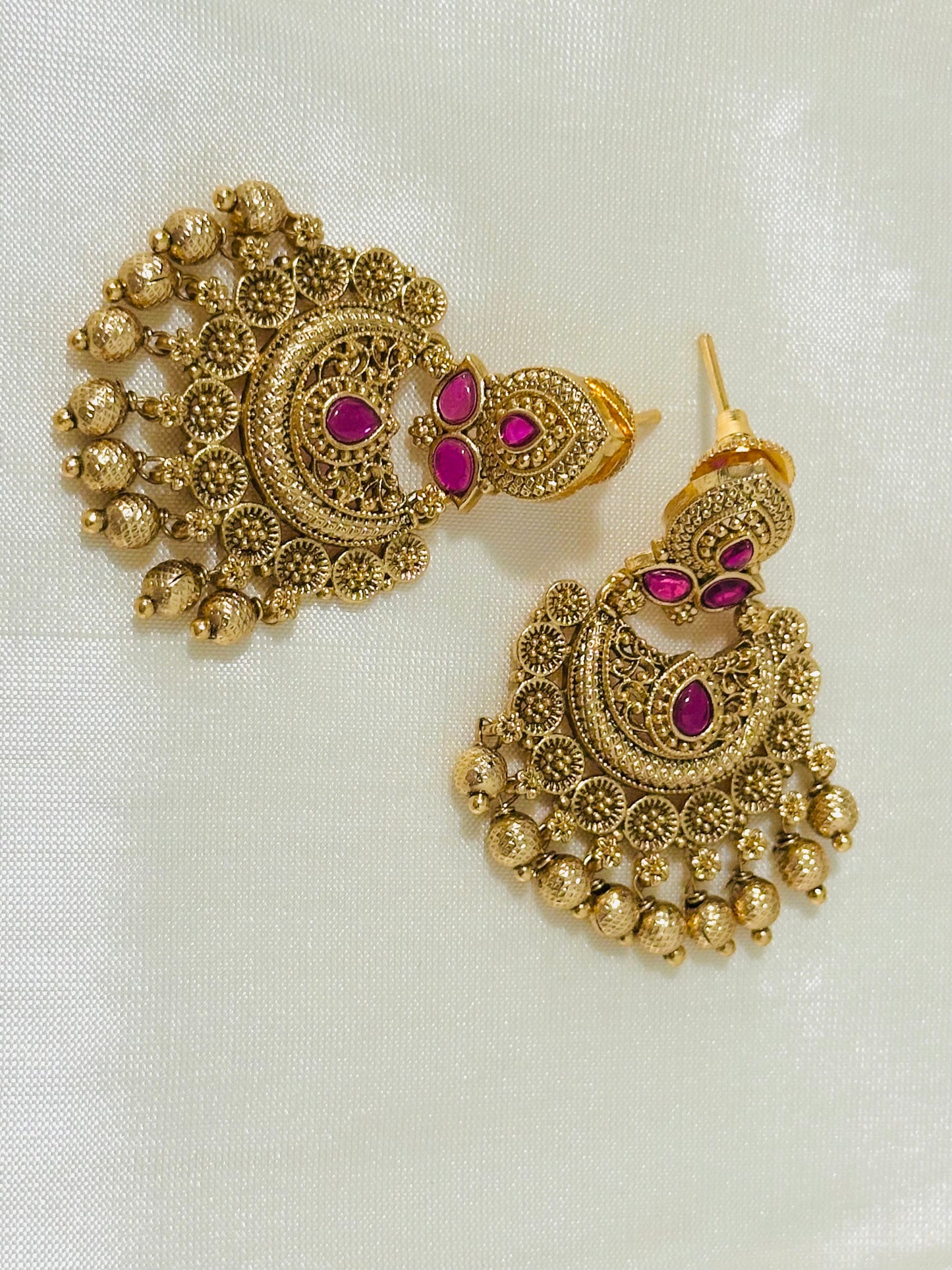 Ornate Gold-Toned Traditional Chandbali Earrings with Ruby Accents
