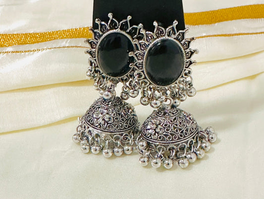 Grand Oxidized Silver Jhumka Earrings with Bold Black Stone