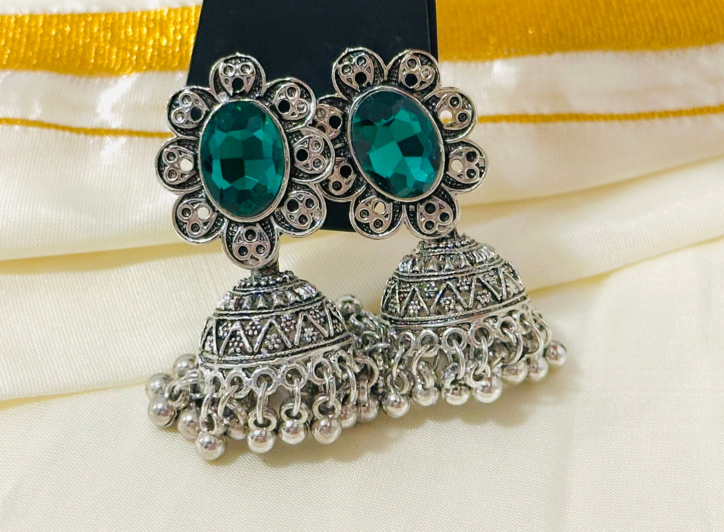 Enchanting Oxidized Silver Jhumka Earrings with color Stone