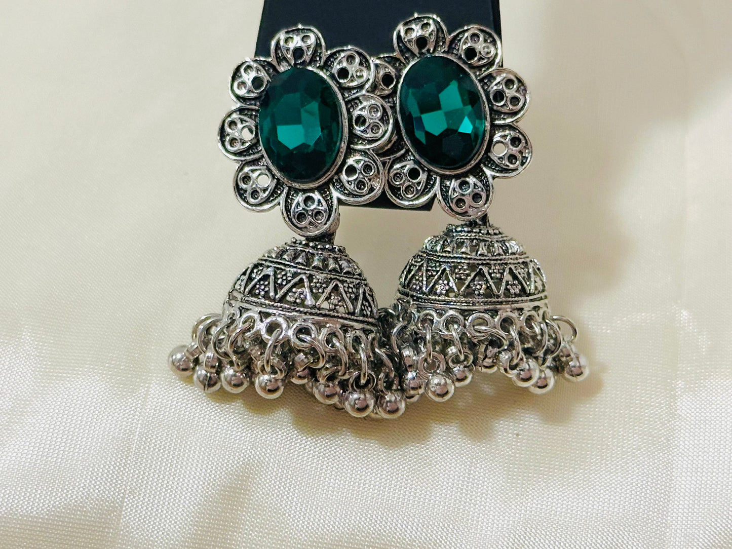 Enchanting Oxidized Silver Jhumka Earrings with color Stone