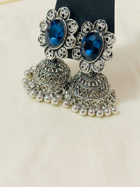 Enchanting Oxidized Silver Jhumka Earrings with color Stone
