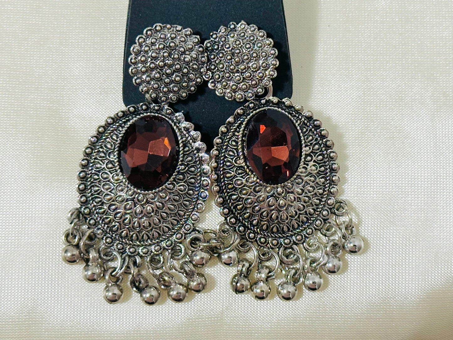 Regal Oxidized Silver Drop Earrings with color Stone