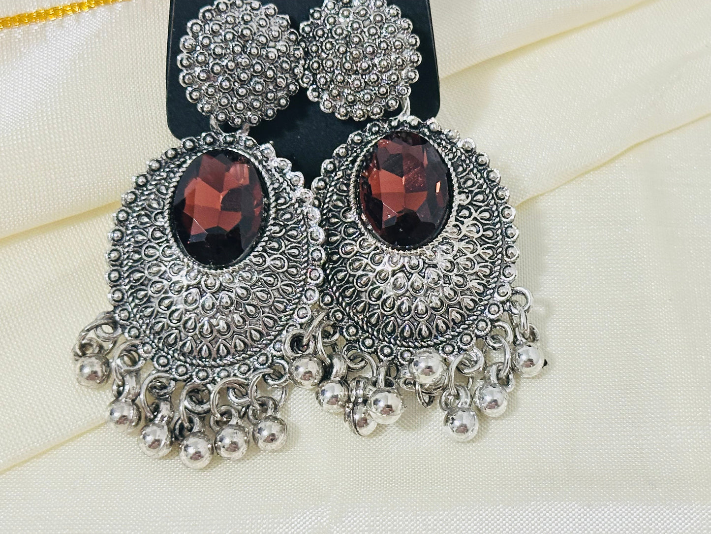Regal Oxidized Silver Drop Earrings with color Stone