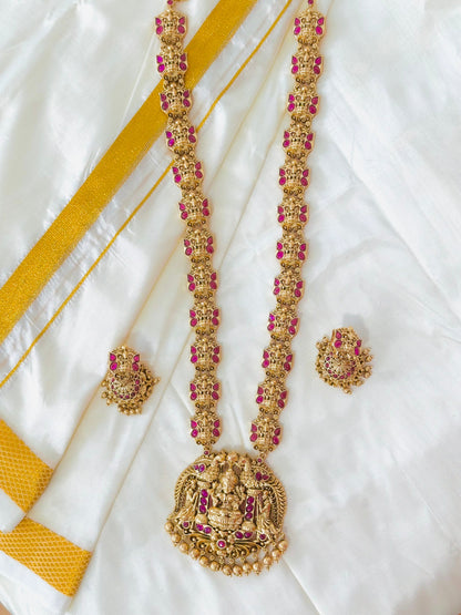 Grand Antique Gold-Toned Lakshmi Haram Necklace and Stud Earring Set with Ruby Accents