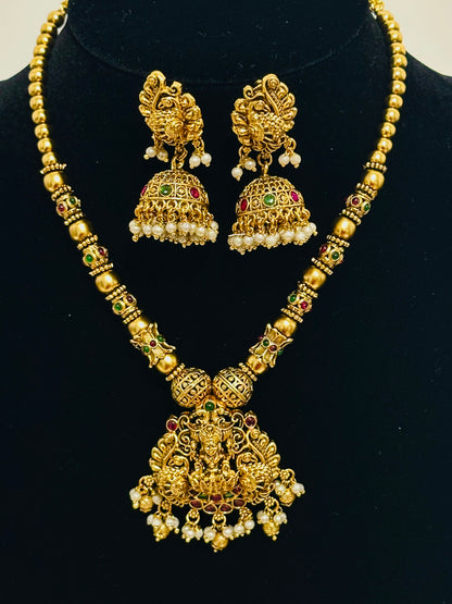 Traditional Indian Gold Pendant Necklace and Jhumka Earring Set with Lakshmi Motif