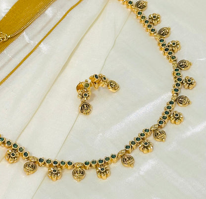 Gold-Toned necklace and Earrings with Green Accents