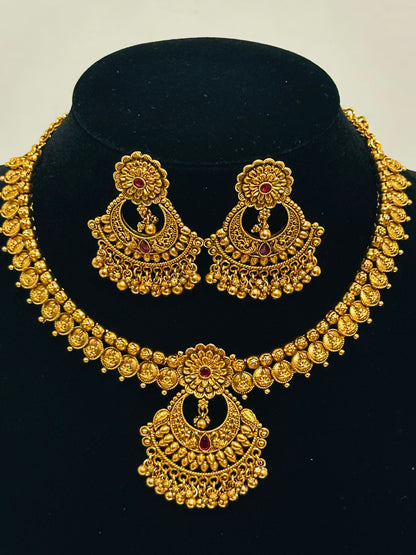 Exquisite Antique Gold-Toned Choker Necklace and Jhumka Earring Set with Floral and Crescent Motifs