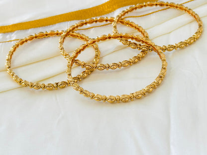 Delicate Gold-Toned Beaded Chain Bangles (Set of 4)