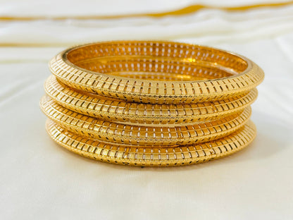Antique Gold-Toned Cut-Out Pattern Bangles (Set of 4)