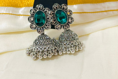 Enchanting Oxidized Silver Jhumka Earrings with color Stone